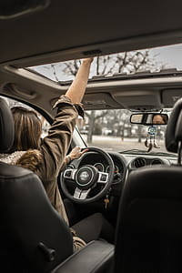 Photo of Woman Driving Car thumbnail