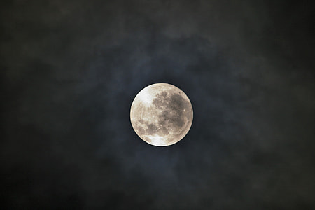 moon surrounded with grey clouds thumbnail