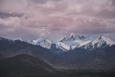 snow-capped mountains at daytime thumbnail