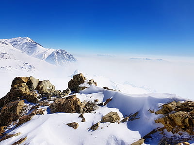 snow-covered mountain and rocks thumbnail