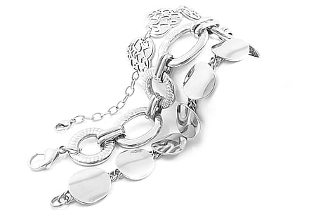 several silver-colored bracelets thumbnail