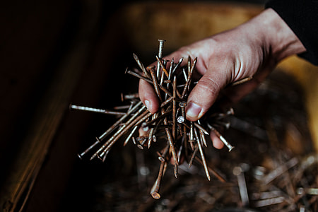 Tools, nails and bolts in a workshop thumbnail