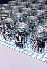 Collection of glass jars with miscellaneous items thumbnail