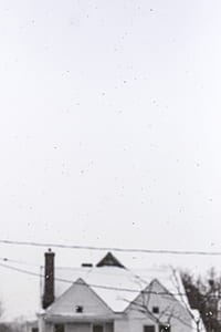 white wooden house near cable thumbnail