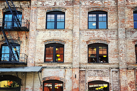 photo of 3 story building brown and white building thumbnail