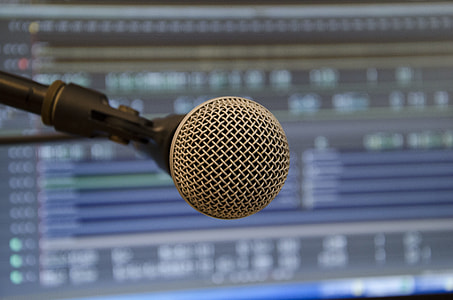 selective photography of gray and black condenser mic thumbnail