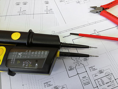 black tester devices on white blueprint thumbnail