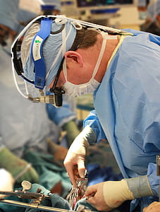 surgeon operating patient thumbnail