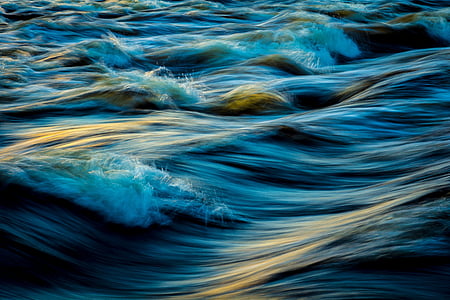 blue ocean waves taken during daytime thumbnail