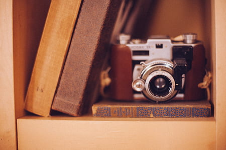 silver and black point-and-shoot camera thumbnail