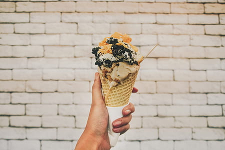 person holding ice cream thumbnail