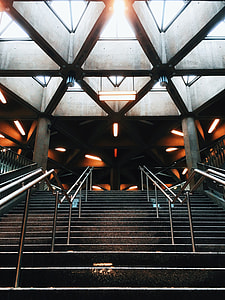 low-angle photography of stair with metal stair handles thumbnail