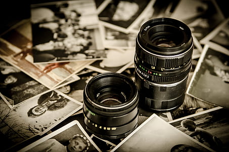 black DSLR camera lens on photo thumbnail