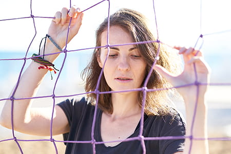 Photo Of Woman Holding Net thumbnail