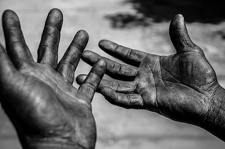 grayscale photo of person's hands thumbnail