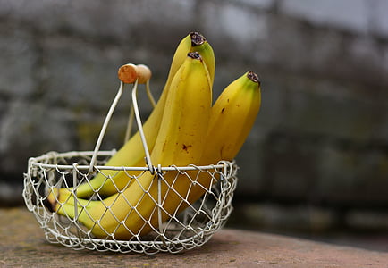 three ripe bananas on basket thumbnail