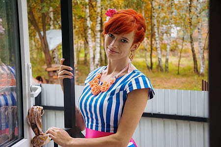 woman holding black post thumbnail