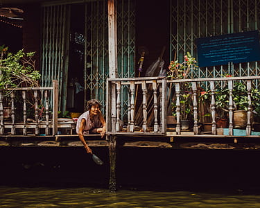 woman sitting on surface thumbnail