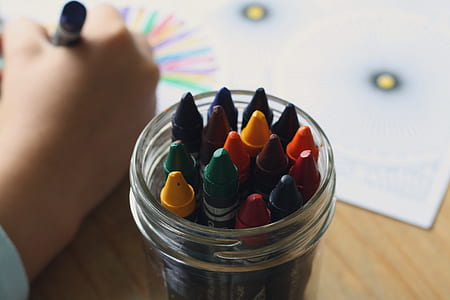 Multicolored Crayons Inside Clear Plastic Round Case thumbnail