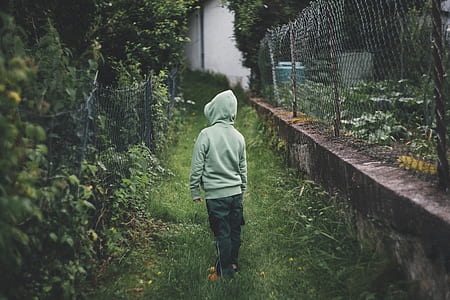 person wearing gray hooded jacket thumbnail