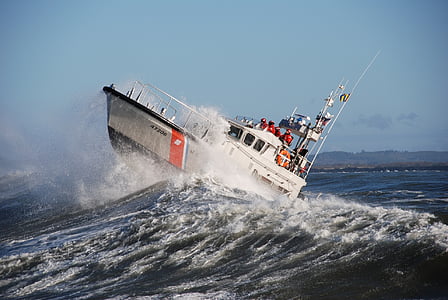 photography of white yacht on sea thumbnail