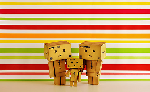 photo of three black wooden figures thumbnail