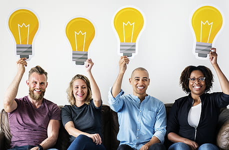 Four Person Holding Bulb Light Decors thumbnail