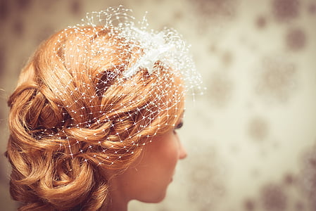shallow focus photography of blonde haired woman wearing white veil thumbnail