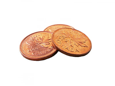 three round copper Canadian dollar coins thumbnail