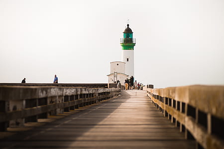 people near lighthouse thumbnail