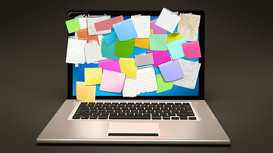 silver MacBook Pro with sticky notes thumbnail