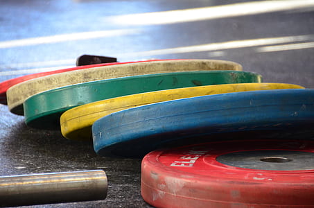 assorted-color barbell plates thumbnail