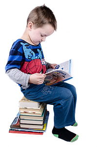 boy sitting reading book thumbnail