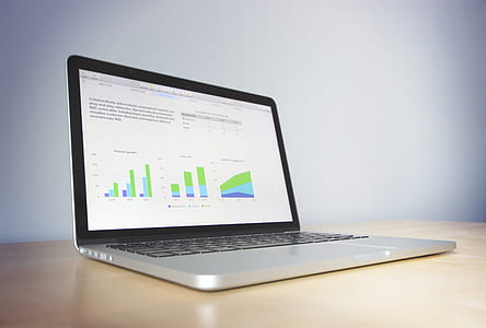 turned on black and gray laptop computer displayed chart thumbnail