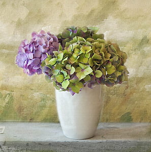 green and pink petal flower in vase centerpiece thumbnail