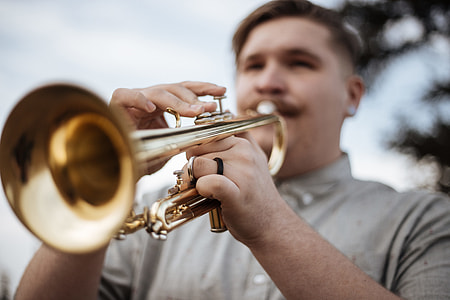 man playing trumpet thumbnail