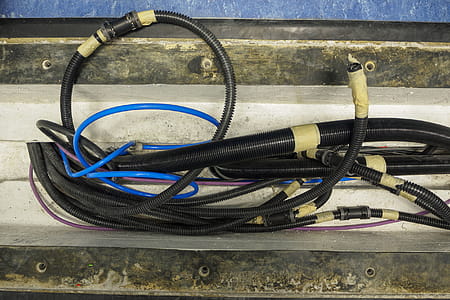 Installation new different colored tubing in a floor opening. thumbnail