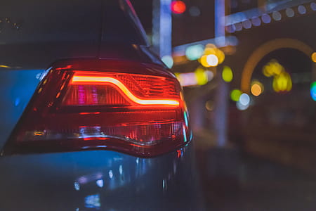 blue car taillight lighting during nighttime thumbnail