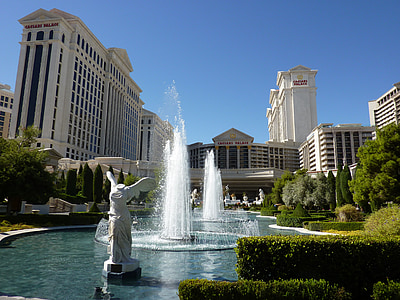 white statue near fountain thumbnail