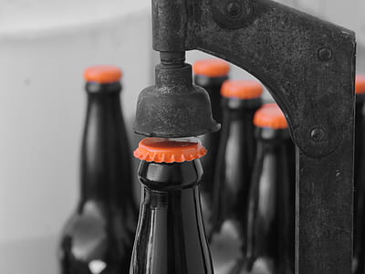 black glass bottles with orange lid thumbnail