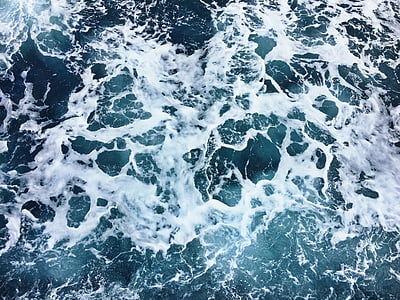 water splashing near stone photo thumbnail