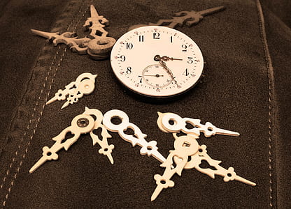 closeup photo of round white analog clock thumbnail