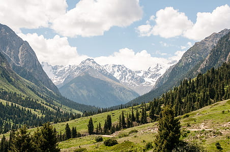 green mountains under blue sky thumbnail