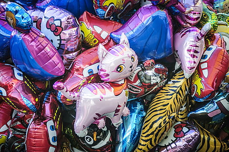 assorted-color-and-design mylar balloons thumbnail