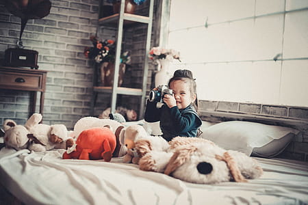 Photo of a Girl Playing With the Camera thumbnail