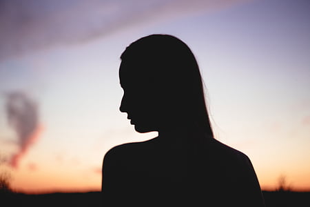 silhouette of woman during golden hour thumbnail