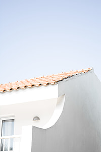 beige roof brick house thumbnail