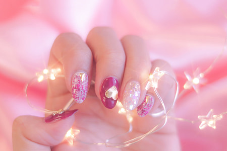 woman showing nail art thumbnail