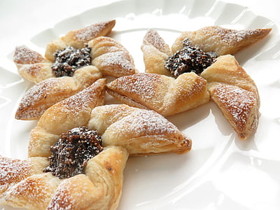 selective focus photography of baked pastry on white plate thumbnail