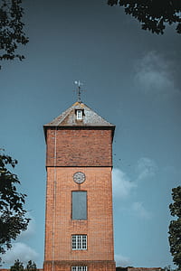 brown concrete building at daytime thumbnail